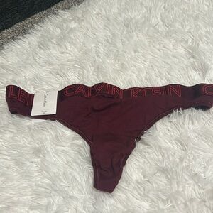 Calvin Klein burgundy thong Medium